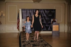 Big and Little at a fashion show